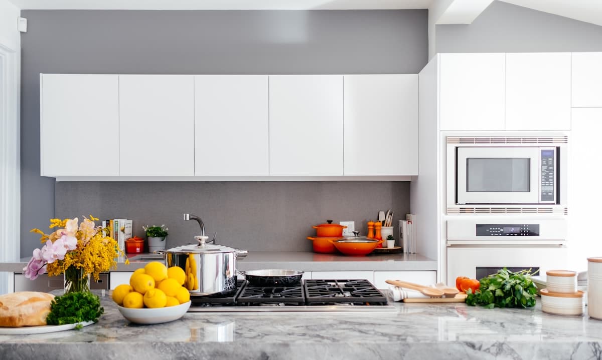 Bright modern kitchen with marble island